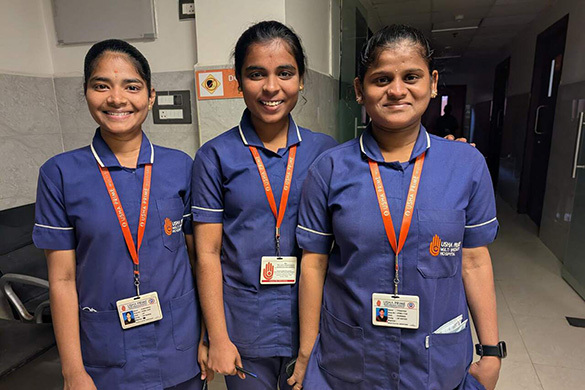 Pavithra, far right at her nursing job.